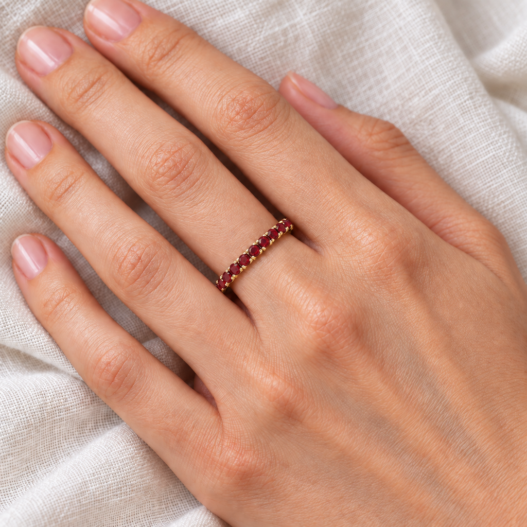 Ruby Eternity Band Stackable Ring 14K Yellow Gold (0.50ct) — ivory linen close-up on left hand