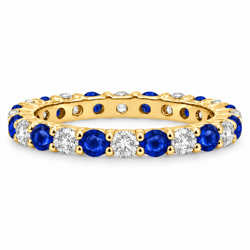 Blue sapphire and diamond eternity ring in 14k yellow gold, alternate profile view