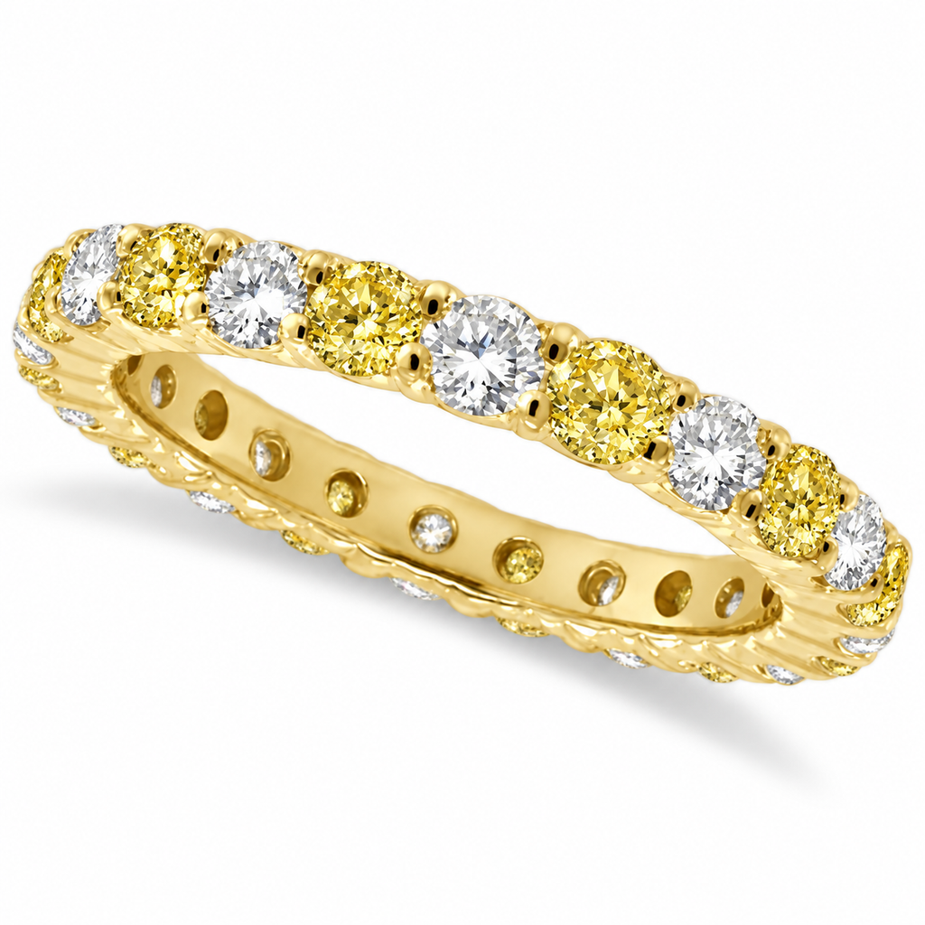 Fancy yellow canary and white diamond eternity band in 14k yellow gold — main product view