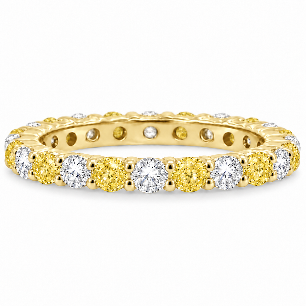 IR538 natural fancy yellow and white diamond eternity band in 14k yellow gold, preserved alternate profile view