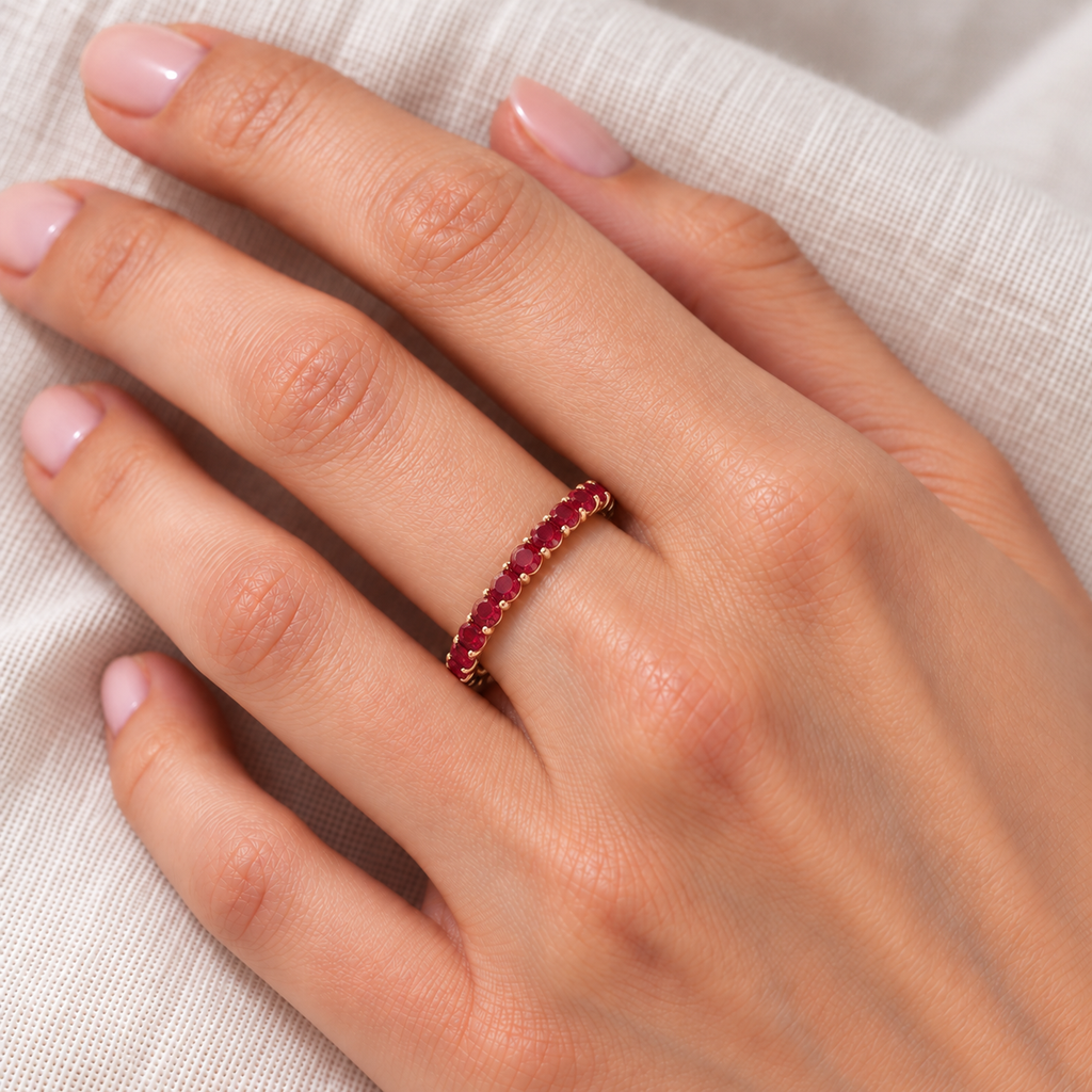 Ruby Eternity Band Stackable Ring 14K Rose Gold (0.50ct) — ivory linen close-up on left hand