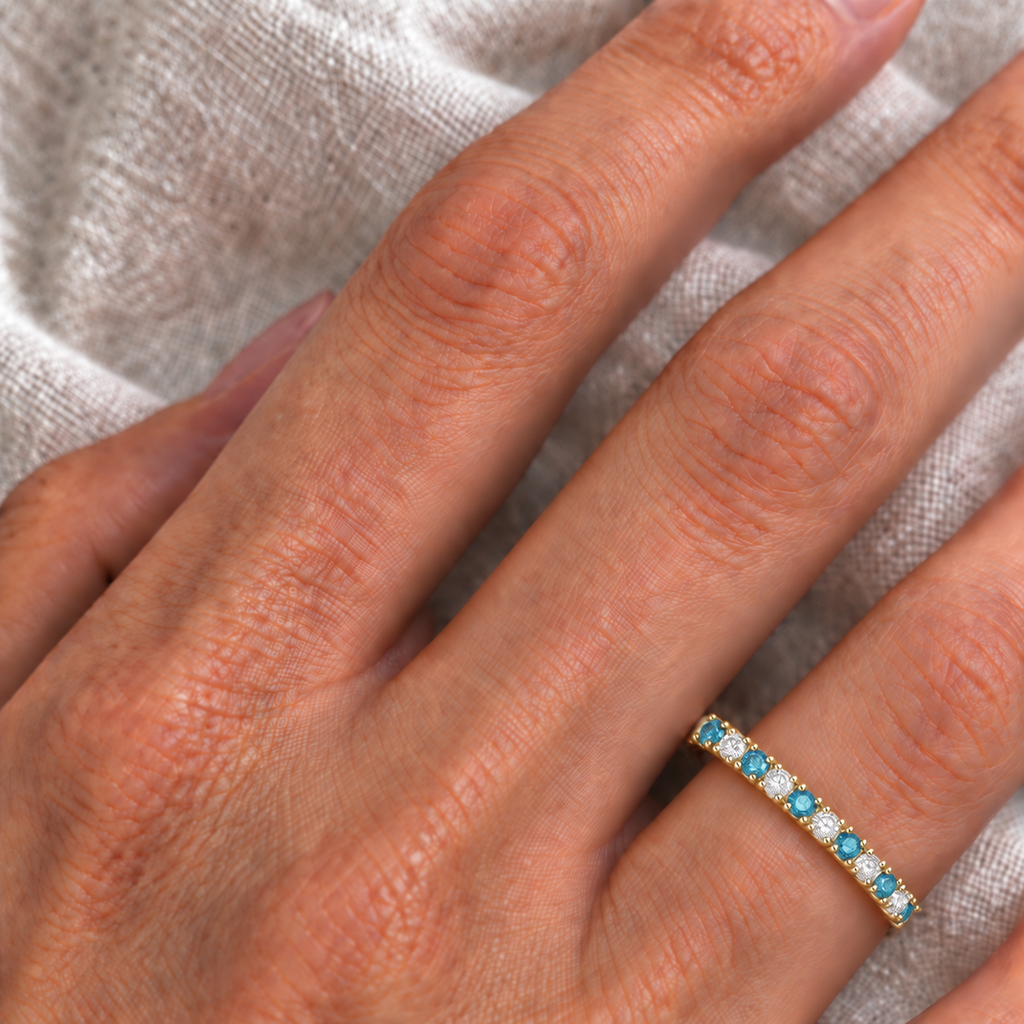 IR671 natural blue and white diamond 14k yellow gold 2 mm band — ivory linen close-up