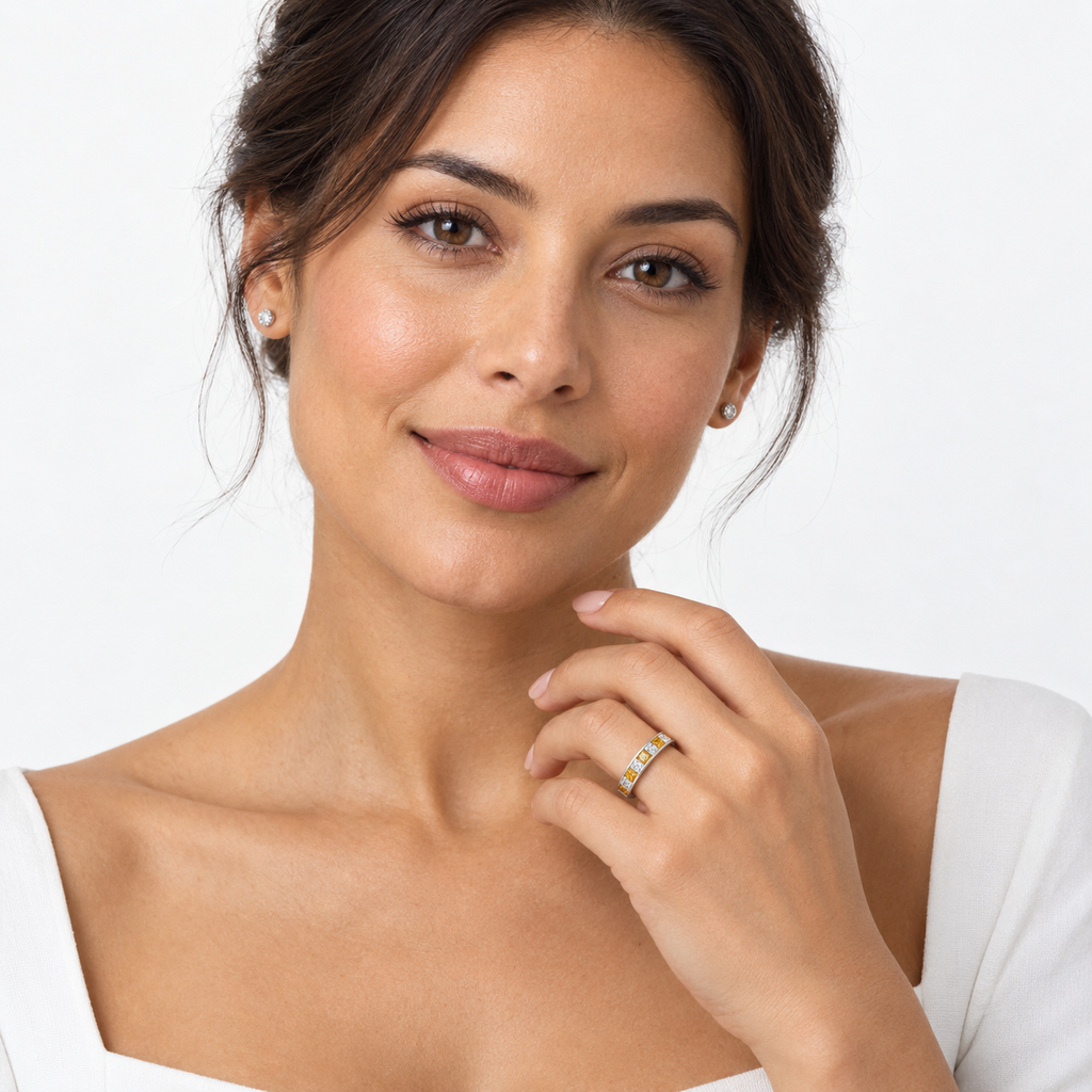 Woman wearing a princess-cut citrine and diamond channel ring in 14K white gold
