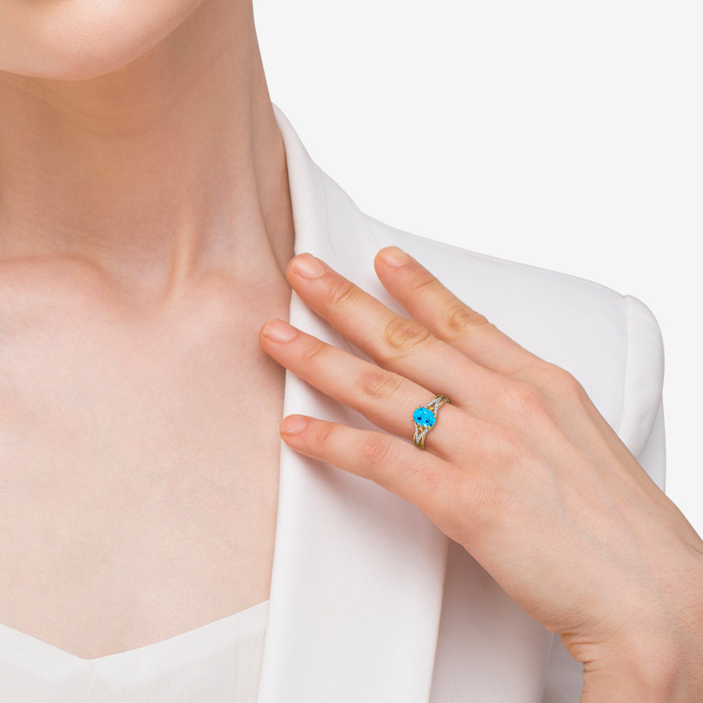 Oval Blue Topaz and Diamond Cocktail Ring 14K Yellow Gold (1.62tcw)