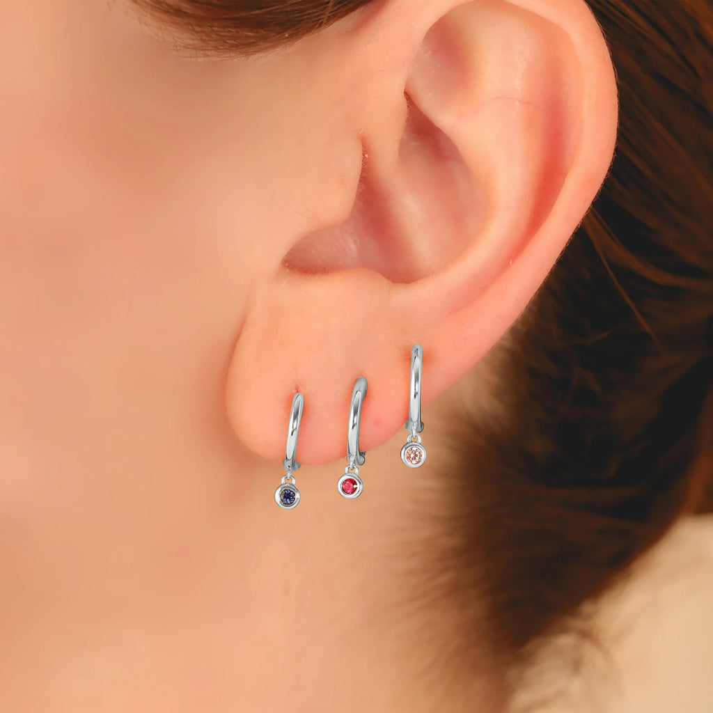 Round Pink Sapphire Bezel Huggie Earrings 14K White Gold (0.08ct)