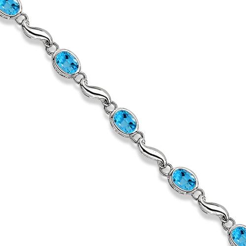 Bezel-Set Oval Blue Topaz Bracelet in 14K White Gold (7x5 mm)