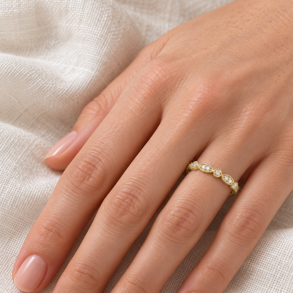 Petite marquise and dot natural diamond wedding band in 14k yellow gold, on hand