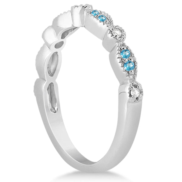Marquise and dot natural blue topaz and diamond band in 18k white gold, upright side view on white