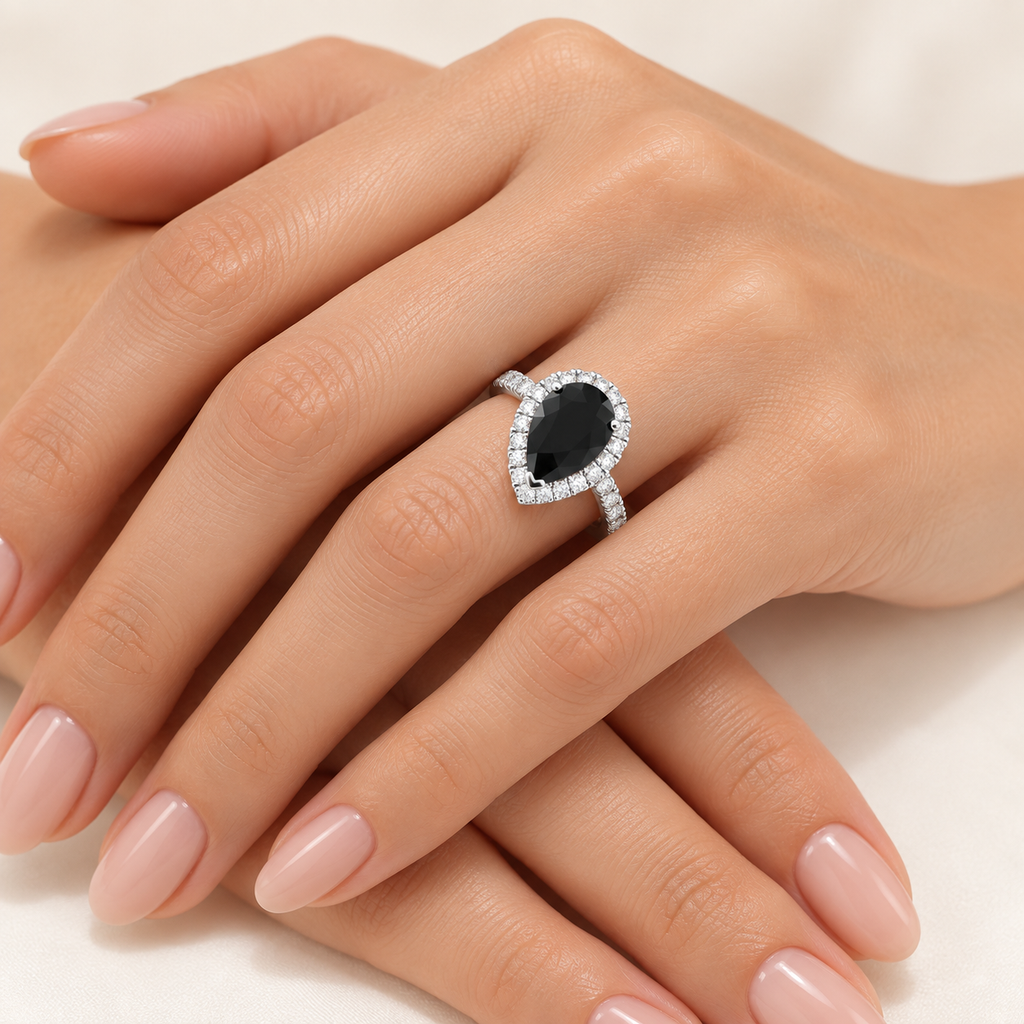 Pear Black Diamond & Diamond Engagement Ring 14K White Gold (2.51ct) — Hand model showing the ring at the base of the ring finger