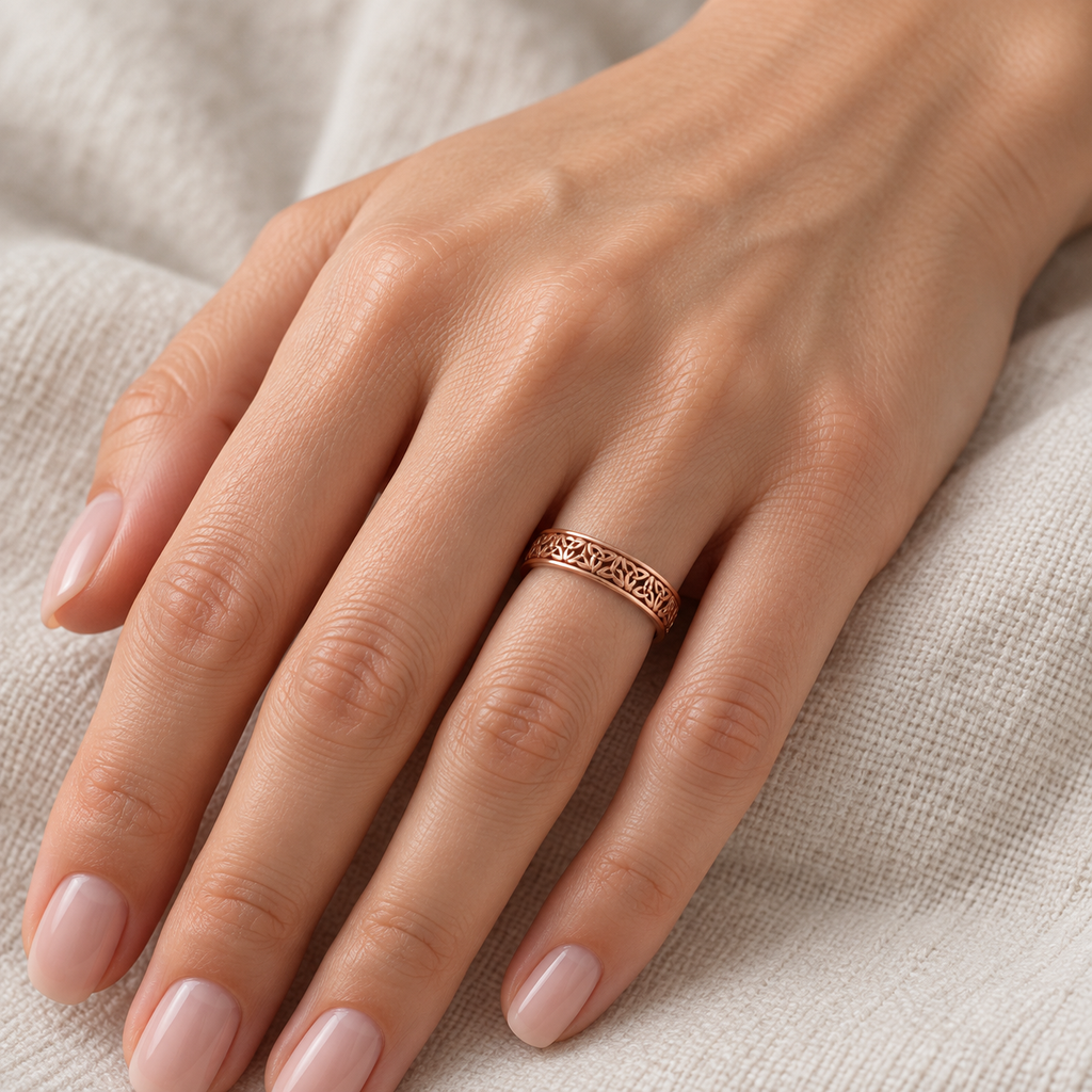 Celtic Knot Infinity Wedding Band Ring 14K Rose Gold — female hand