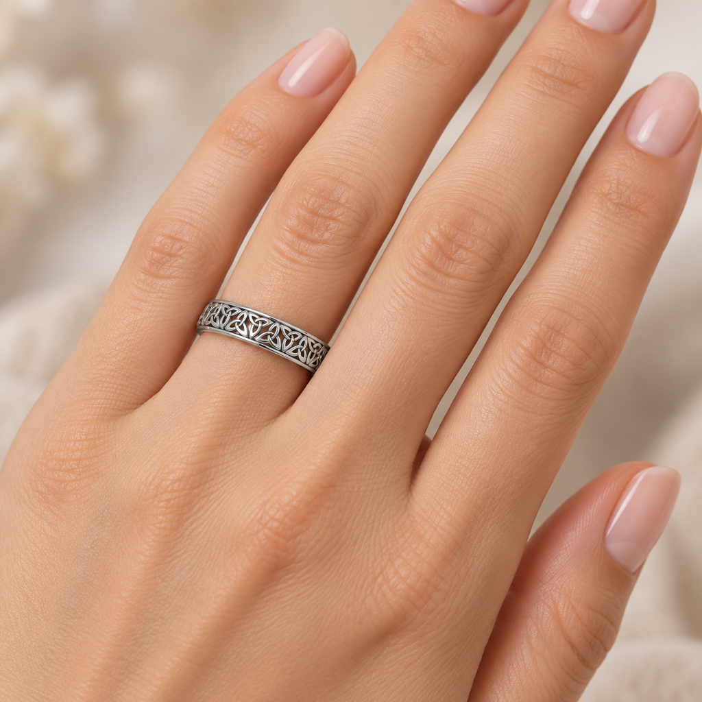 Celtic Knot Infinity Wedding Band Ring Platinum — Female hand wearing wedding band