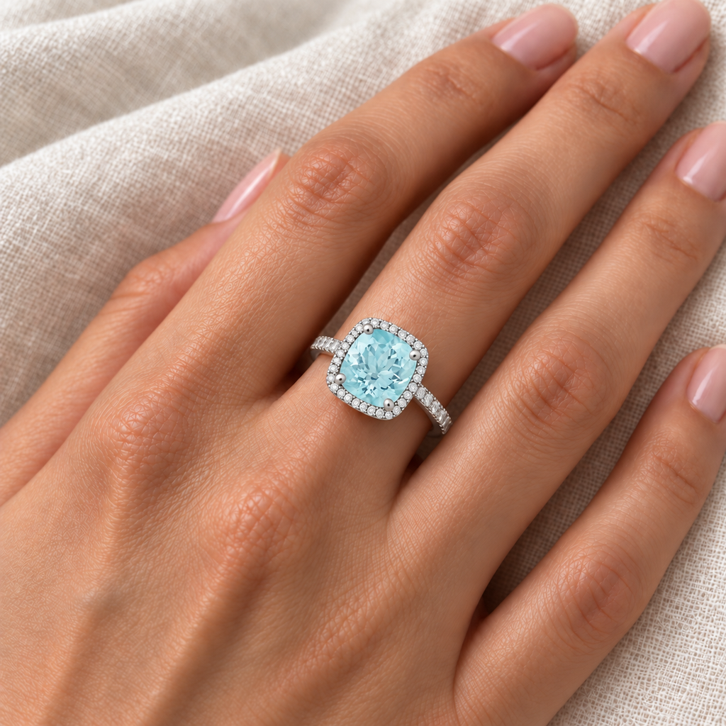 Cushion-Cut Aquamarine & Diamond Cocktail Ring 14k White Gold (3.70ctw) — close-up on ivory linen