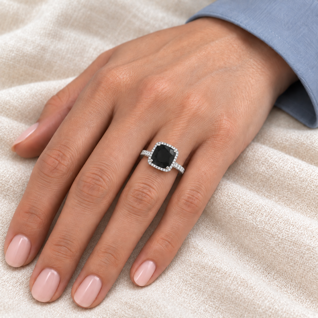 AZ19075 black diamond white gold ring close-up on ivory linen