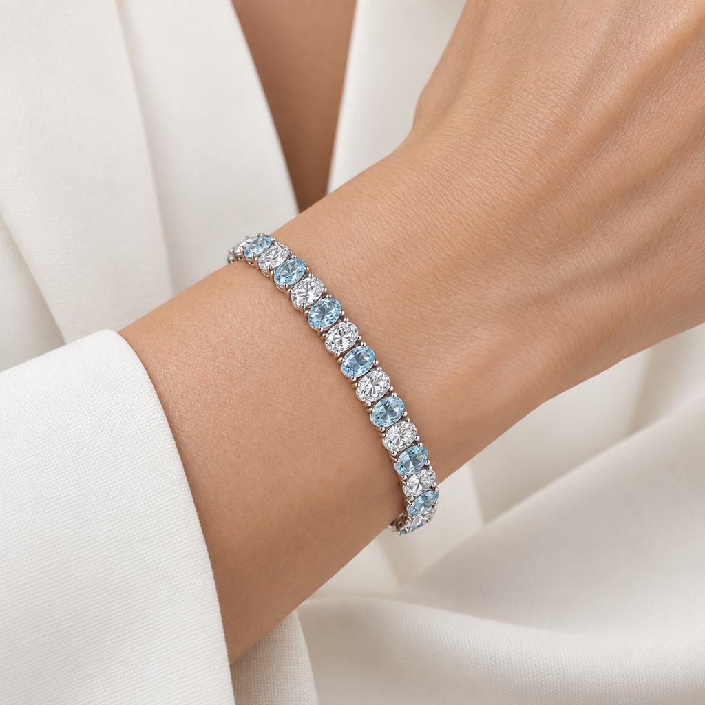 Aquamarine and diamond tennis bracelet 6.00ctw diamonds in 14k white gold - worn on wrist