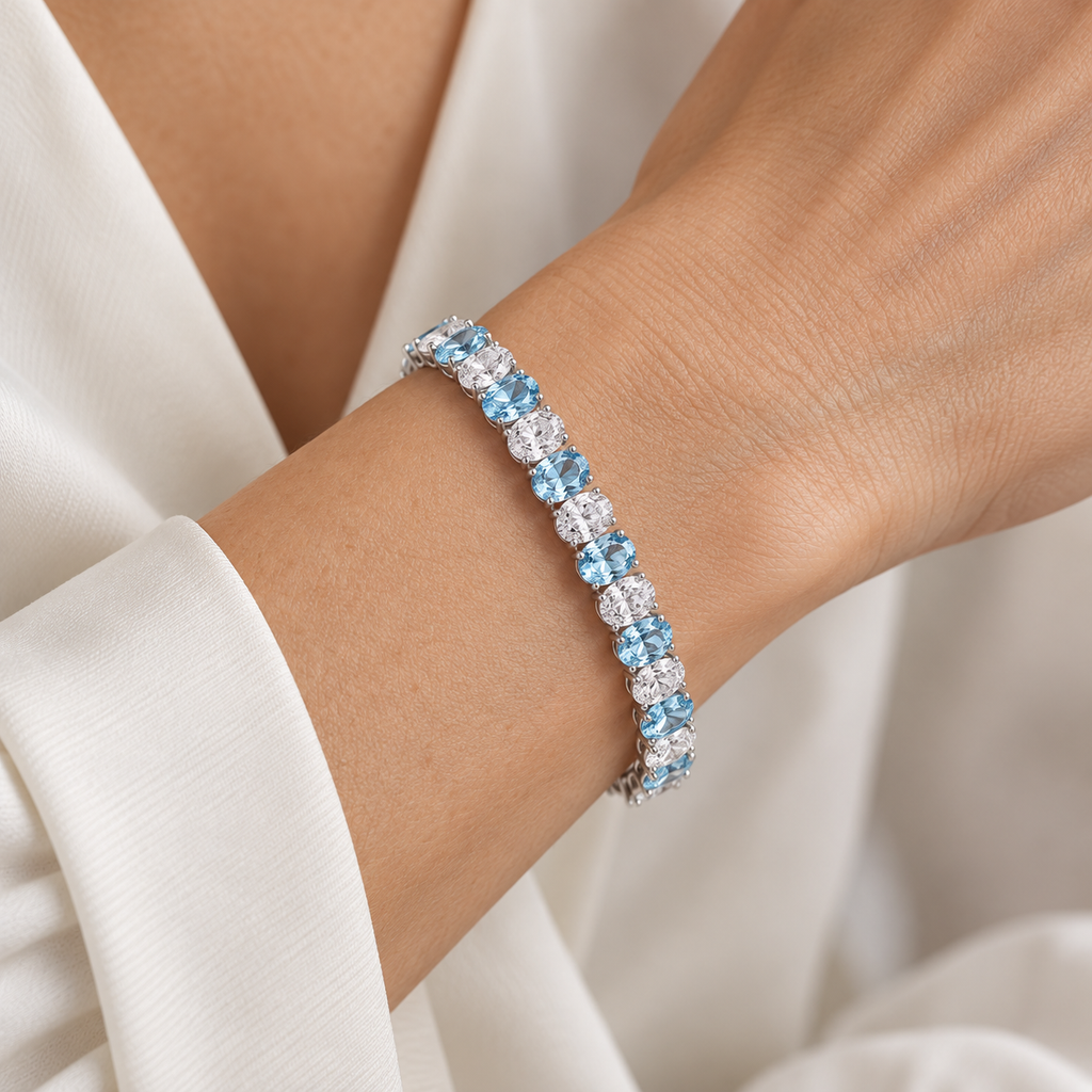 Aquamarine and diamond tennis bracelet 7.46ctw diamonds in 14k white gold - worn on wrist