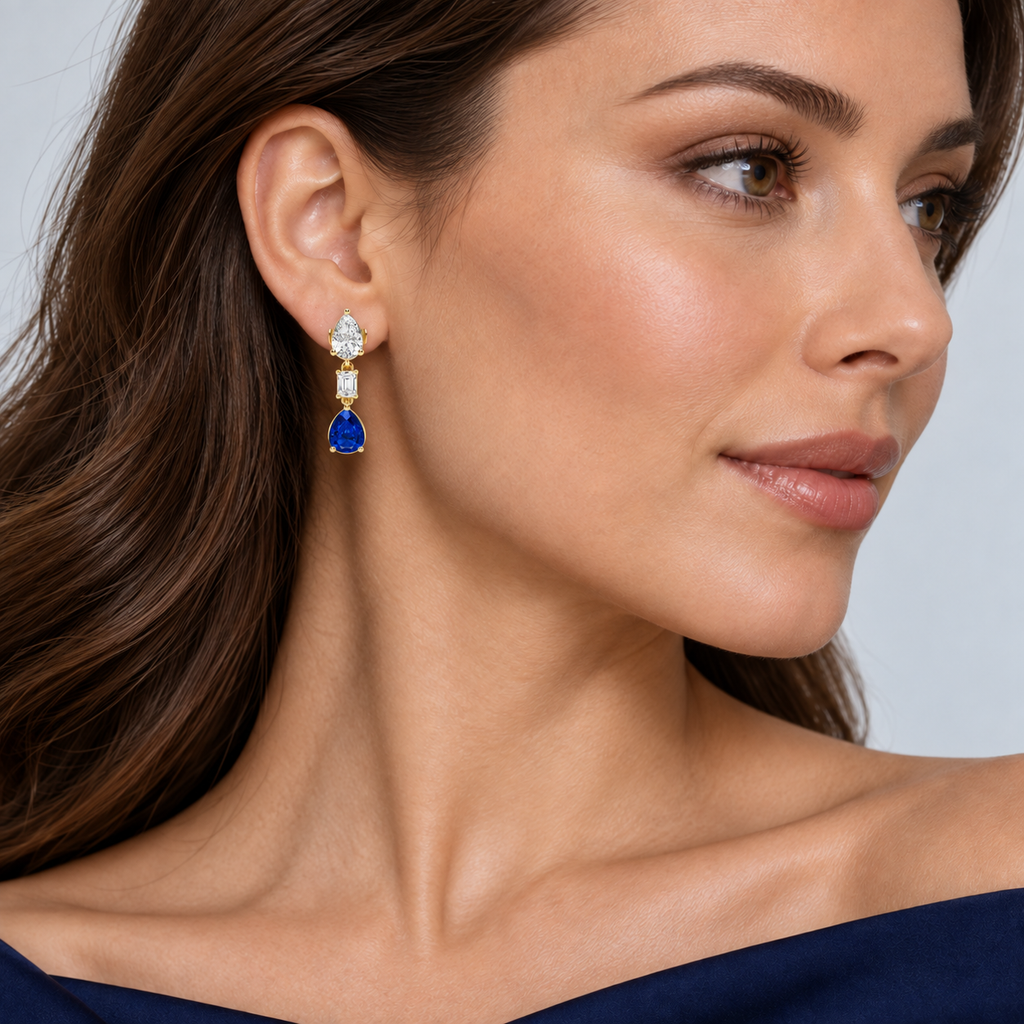 Pear Lab Grown Blue Sapphire & Diamond Drop Earrings 14k Yellow Gold — on model, scaled to 1.20 inches long and 0.33 inches wide