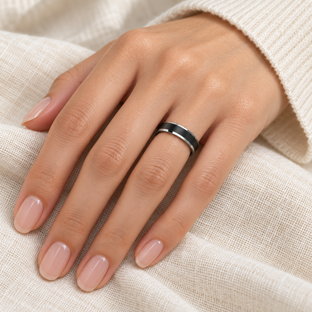 Beveled Edge with Black Brushed Carbide Tungsten Wedding Band (4mm) — female hand wearing wedding band