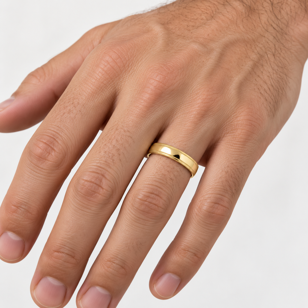 Carved Wedding Band in 14k Yellow Gold (4mm) - male hand close-up