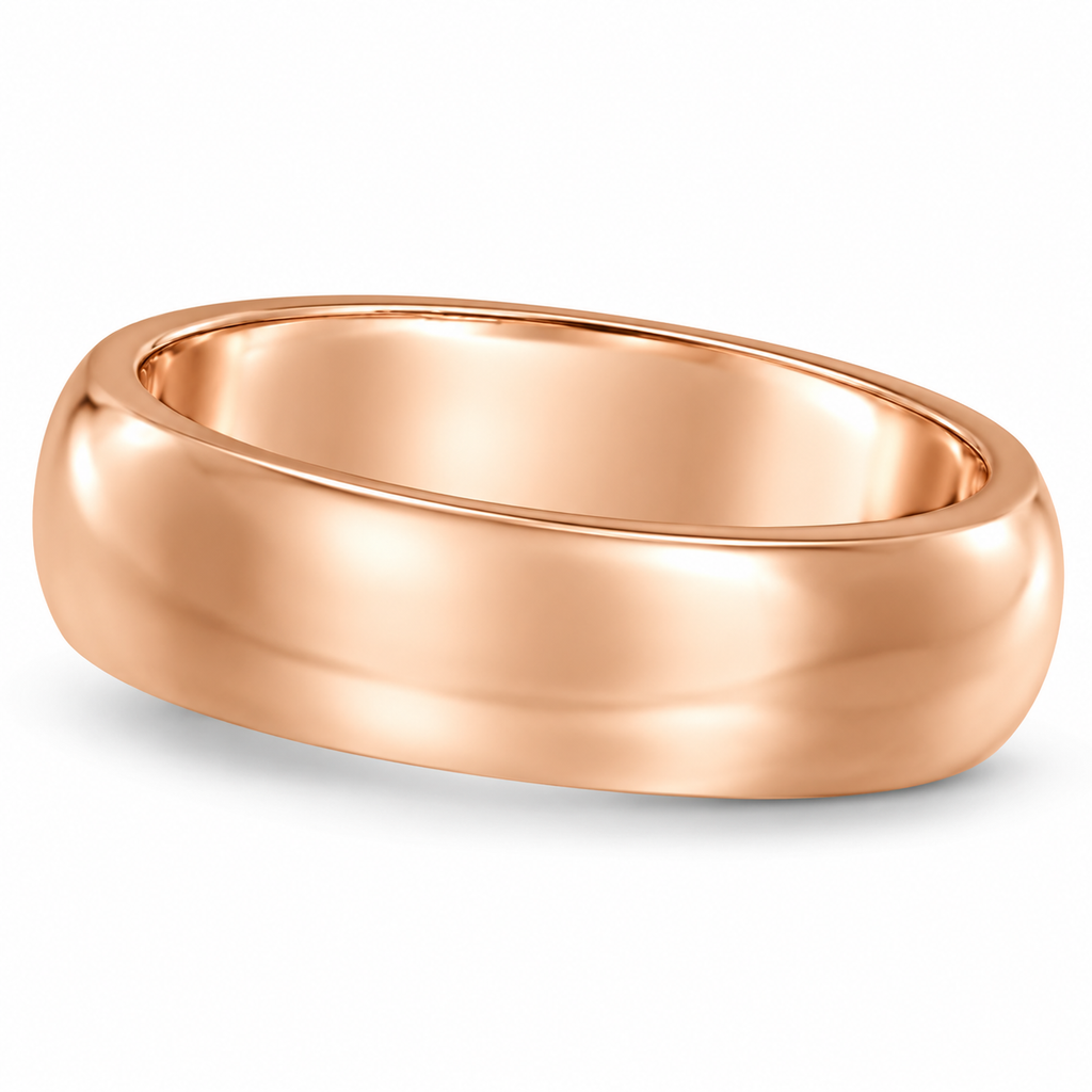 6mm 14k rose gold dome comfort-fit wedding band - forward-facing gentle angled hero with natural shadow