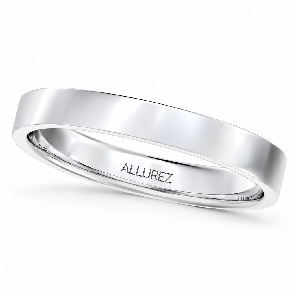 UB55 — 3mm 14k white gold flat comfort-fit wedding band; upright reverse-oblique hero, gentle left-high right-low tilt, white background and natural soft gray ground shadow.