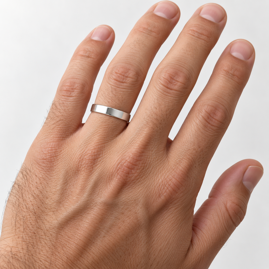 4mm 14k white gold European-fit wedding band on male hand