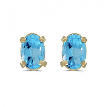 Oval Blue Topaz Stud Earrings in 14k Yellow Gold (1.14tcw)