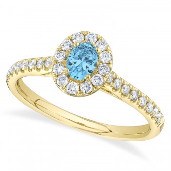 Oval Blue Topaz Solitaire & Diamond Engagement Ring 14K Yellow Gold (0.62ct)